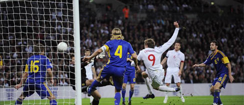 Crouch reacts quickest to open the scoring at Wembley